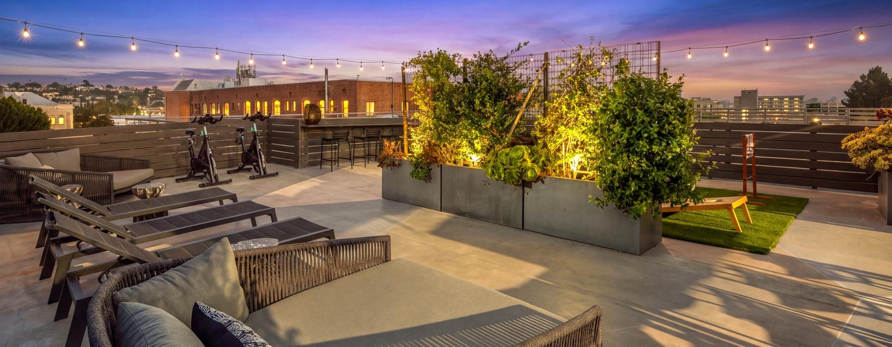 a patio with chairs and a pool