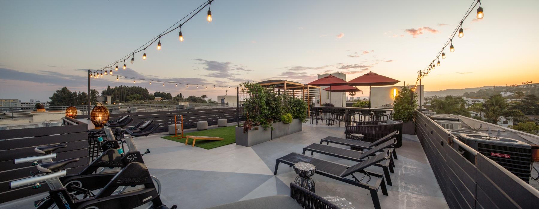 a patio with tables and chairs